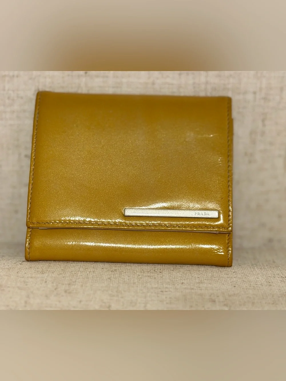 Prada Glossy Mustard Patent Leather Wallet with Silver Logo Bar